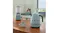 A collection of slate grey Smeg x Porsche appliances including a kettle, blender, and toaster on a table A collection of slate grey Smeg x Porsche appliances including a kettle, blender, and toaster on a table