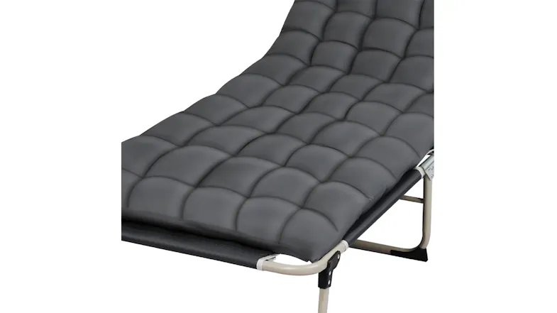 Close‑up of the thick, padded sleeping surface on the Levede folding camping cot Close‑up of the thick, padded sleeping surface on the Levede folding camping cot