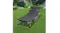 Levede folding camping cot set up outdoors on grass, showing the full length and reclining position Levede folding camping cot set up outdoors on grass, showing the full length and reclining position