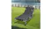 The adjustable camp cot is placed on grass near water, shown as a comfortable outdoor lounging bed The adjustable camp cot is placed on grass near water, shown as a comfortable outdoor lounging bed