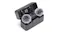 Angled view of an open DJI Mic Mini 2 charging case, showing two transmitters with furry windshields Angled view of an open DJI Mic Mini 2 charging case, showing two transmitters with furry windshields