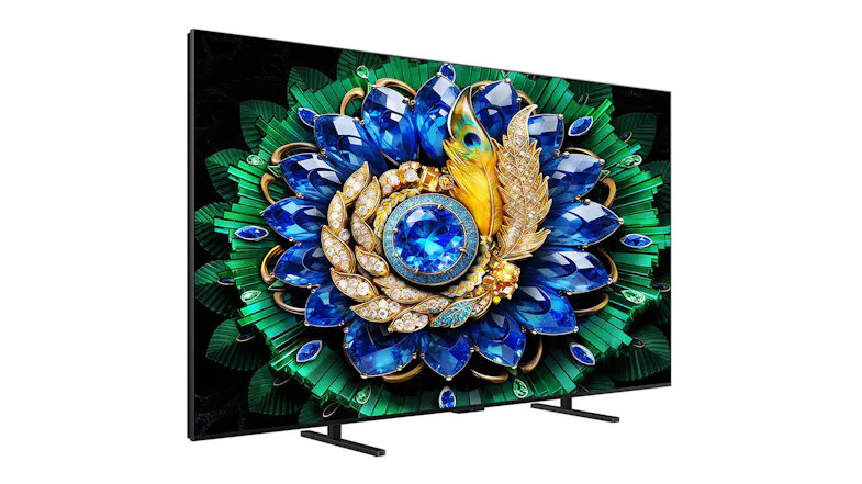 Three‑quarter angled left view of the TCL TV, showing the slim chassis and sturdy stand feet Three‑quarter angled left view of the TCL TV, showing the slim chassis and sturdy stand feet