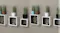 Mounted six cube wall shelves, each holding small decor items Mounted six cube wall shelves, each holding small decor items