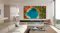 Daytime living room scene with the TV wall‑mounted above a low console, showing a vivid aerial lake image Daytime living room scene with the TV wall‑mounted above a low console, showing a vivid aerial lake image