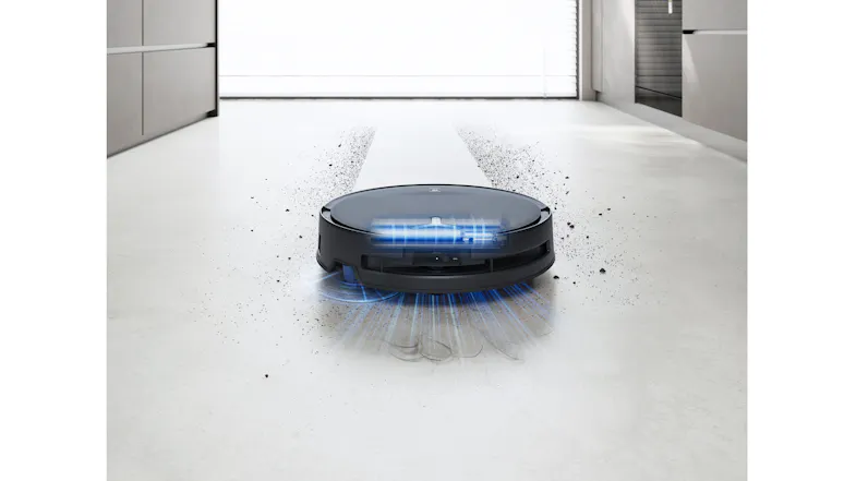 Circular vacuum creates a clean white path through floor debris Circular vacuum creates a clean white path through floor debris