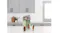 The green SLUSHi machine sits on a white kitchen island, dispensing a chocolate milkshake into a tall glass The green SLUSHi machine sits on a white kitchen island, dispensing a chocolate milkshake into a tall glass