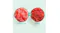 Top‑down view of two red frozen drinks side by side. The left shows smooth slush labelled “Ninja SLUSHi Max” Top‑down view of two red frozen drinks side by side. The left shows smooth slush labelled “Ninja SLUSHi Max”