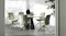Oval light-top dining table with a black geometric base, surrounded by six olive green upholstered chairs Oval light-top dining table with a black geometric base, surrounded by six olive green upholstered chairs