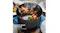 A large dark grey cooking pot filled with steaming beef stew, potatoes, carrots, and onions A large dark grey cooking pot filled with steaming beef stew, potatoes, carrots, and onions