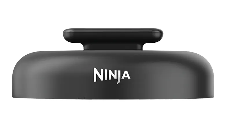 Side view of the Ninja cooker lid in dark grey with the Ninja logo visible Side view of the Ninja cooker lid in dark grey with the Ninja logo visible