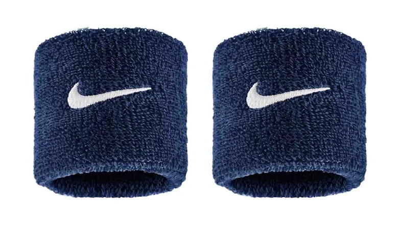 Pair of navy blue Nike wristbands with white Swoosh logo Pair of navy blue Nike wristbands with white Swoosh logo