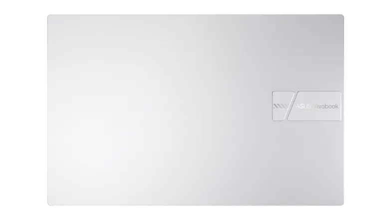Top-down view of a closed silver ASUS Vivobook laptop with the logo on the lid Top-down view of a closed silver ASUS Vivobook laptop with the logo on the lid