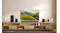 LG OLED TV on a wooden stand showcasing a lush mountain landscape LG OLED TV on a wooden stand showcasing a lush mountain landscape