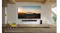 Wall-mounted LG OLED TV featuring a lush mountain landscape Wall-mounted LG OLED TV featuring a lush mountain landscape