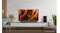 Modern living room featuring a Mini-LED TV above a soundbar Modern living room featuring a Mini-LED TV above a soundbar