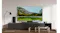 Modern living room featuring a Mini-LED TV above a soundbar Modern living room featuring a Mini-LED TV above a soundbar