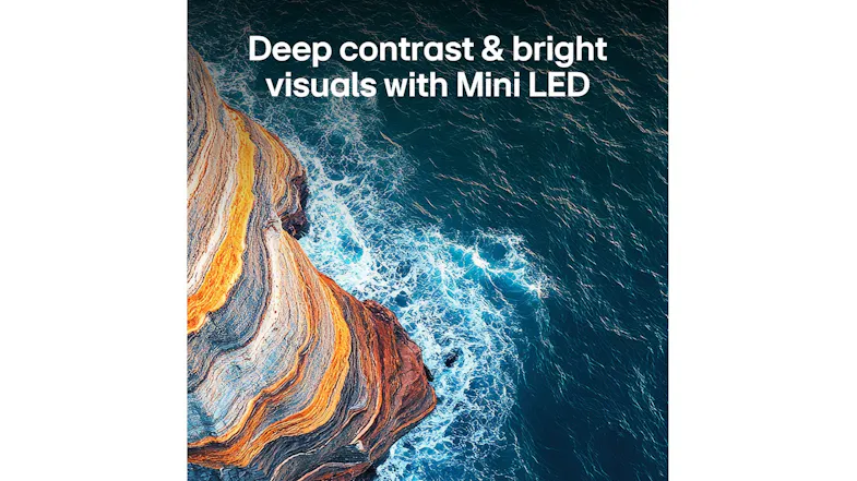 Aerial view of ocean waves hitting a rocky shore, with text about deep contrast and bright visuals Aerial view of ocean waves hitting a rocky shore, with text about deep contrast and bright visuals