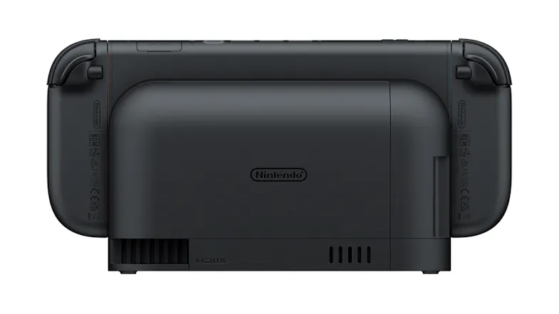 Nintendo Switch 2 dock with Joy‑Cons attached, showing vents, HDMI label, and Nintendo logo Nintendo Switch 2 dock with Joy‑Cons attached, showing vents, HDMI label, and Nintendo logo