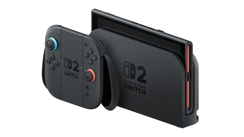 A Nintendo Switch 2 dock, with Joy‑Con controller attached, showing console inserted into charging station A Nintendo Switch 2 dock, with Joy‑Con controller attached, showing console inserted into charging station