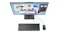 A front view of a Lenovo all‑in‑one PC with a widescreen display, Windows multitasking view, and a matching keyboard and mouse A front view of a Lenovo all‑in‑one PC with a widescreen display, Windows multitasking view, and a matching keyboard and mouse
