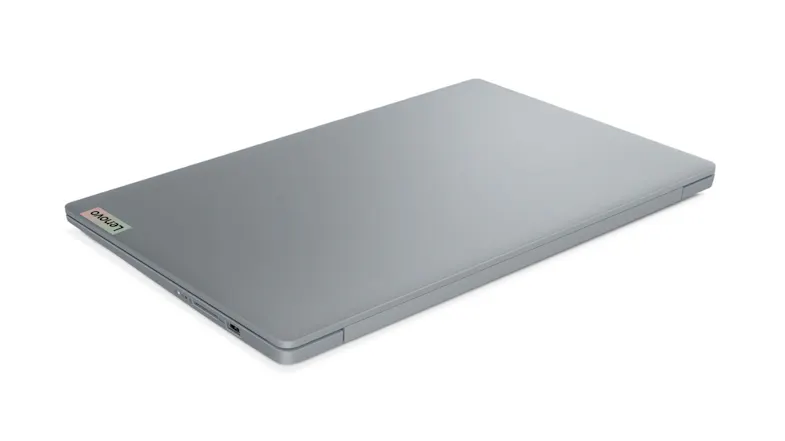 An angled view of a closed Lenovo laptop, showcasing a slim design, smooth lid, compact, and lightweight build An angled view of a closed Lenovo laptop, showcasing a slim design, smooth lid, compact, and lightweight build