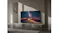 Samsung smart TV on a low stand showing the Milky Way over desert dunes in a contemporary interior setting Samsung smart TV on a low stand showing the Milky Way over desert dunes in a contemporary interior setting