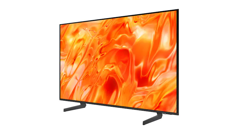 Angled view of a thin Samsung TV showing bright orange abstract artwork on a nearly bezel-less display Angled view of a thin Samsung TV showing bright orange abstract artwork on a nearly bezel-less display