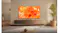 Modern living room with a wall-mounted TV displaying bright abstract art above a wooden console and a plant Modern living room with a wall-mounted TV displaying bright abstract art above a wooden console and a plant