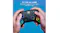 Lifestyle shot featuring a person's hands holding the controller device Lifestyle shot featuring a person's hands holding the controller device