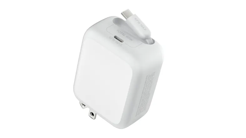 Top view of Belkin charger highlighting labelled power output, built‑in USB‑C cable slot, and compact square shape Top view of Belkin charger highlighting labelled power output, built‑in USB‑C cable slot, and compact square shape