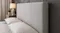 Grey Austin King Upholstered Headboard with white pillows in a modern bedroom Grey Austin King Upholstered Headboard with white pillows in a modern bedroom