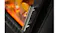 Close-up of a chrome handle on a black Dimplex electric fireplace door with a warm glow Close-up of a chrome handle on a black Dimplex electric fireplace door with a warm glow