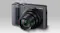 Angled view of a Lumix camera with an extended lens Angled view of a Lumix camera with an extended lens