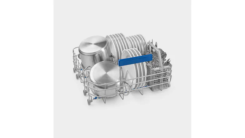 Lower dishwasher rack holding pots, pans, plates, and a cutlery basket, designed for stable loading of larger cookware Lower dishwasher rack holding pots, pans, plates, and a cutlery basket, designed for stable loading of larger cookware