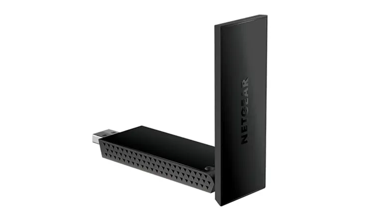 Netgear A7500 Nighthawk AC1800 dual‑band Wi‑Fi USB‑A adapter shown with extended flip‑open antenna Netgear A7500 Nighthawk AC1800 dual‑band Wi‑Fi USB‑A adapter shown with extended flip‑open antenna