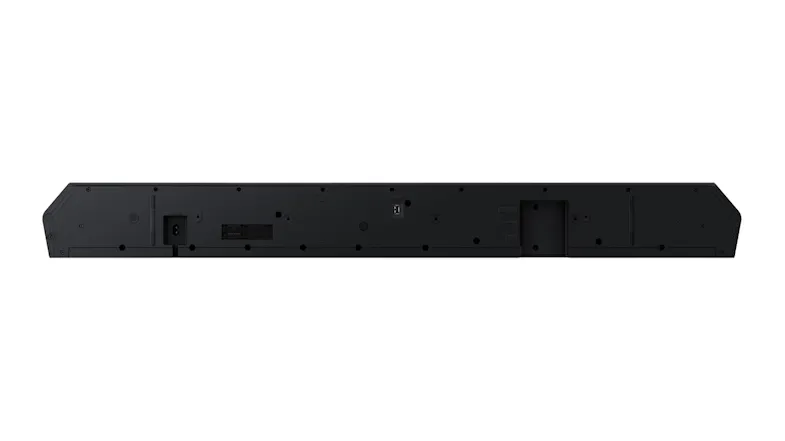 Rear view of a long black soundbar showing mounting points, connection ports, and input panel across the back Rear view of a long black soundbar showing mounting points, connection ports, and input panel across the back