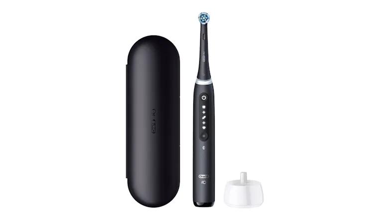 Oral-B iO5 electric toothbrush with travel case and charging base, shown upright Oral-B iO5 electric toothbrush with travel case and charging base, shown upright