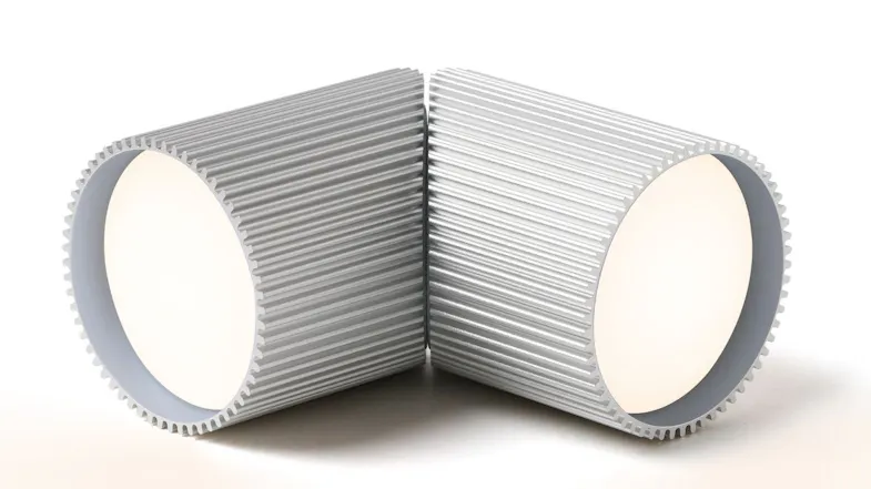 Lexon Ray LED lights are placed flat side by side, showing soft white illumination and symmetrical design Lexon Ray LED lights are placed flat side by side, showing soft white illumination and symmetrical design