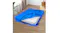 Blue mattress storage bag partially unzipped on a bedroom floor, revealing a white mattress inside, next to boxes and plants Blue mattress storage bag partially unzipped on a bedroom floor, revealing a white mattress inside, next to boxes and plants
