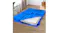 Blue Dreamz mattress storage bag partially open with mattress inside in a room with moving boxes and plants Blue Dreamz mattress storage bag partially open with mattress inside in a room with moving boxes and plants