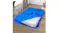 Blue Dreamz PE mattress storage bag partially unzipped, revealing a white mattress in a modern room Blue Dreamz PE mattress storage bag partially unzipped, revealing a white mattress in a modern room