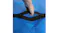 Hand gripping the black handle of a blue mattress storage bag, showing the carry strap detail Hand gripping the black handle of a blue mattress storage bag, showing the carry strap detail