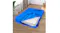 Blue Dreamz PE tarpaulin mattress storage bag, partly unzipped on the floor, showing a mattress in a home setting Blue Dreamz PE tarpaulin mattress storage bag, partly unzipped on the floor, showing a mattress in a home setting