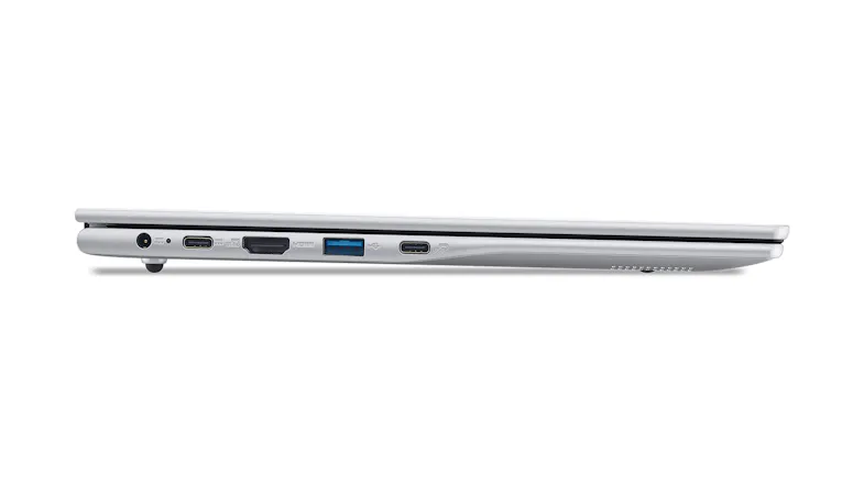 Left-side edge view of the silver laptop showing the power, HDMI, and USB ports Left-side edge view of the silver laptop showing the power, HDMI, and USB ports