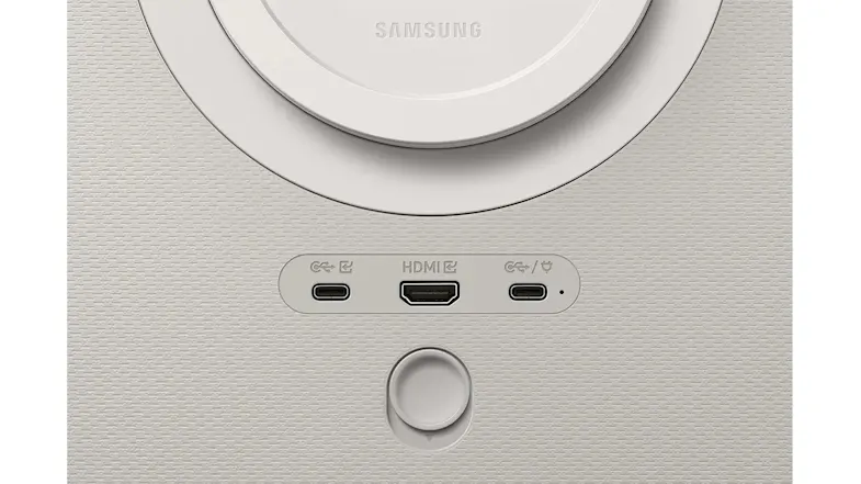 Back view comparison of the Samsung Smart Monitor on a stand and being carried by the handle to show portability and design Back view comparison of the Samsung Smart Monitor on a stand and being carried by the handle to show portability and design