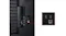 Rear view of a TV showing HDMI, USB, and LAN ports, with a zoomed-in inset highlighting the connections Rear view of a TV showing HDMI, USB, and LAN ports, with a zoomed-in inset highlighting the connections