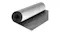 Rolled foam mat partially unrolled, showing textured black underside on a flat surface Rolled foam mat partially unrolled, showing textured black underside on a flat surface