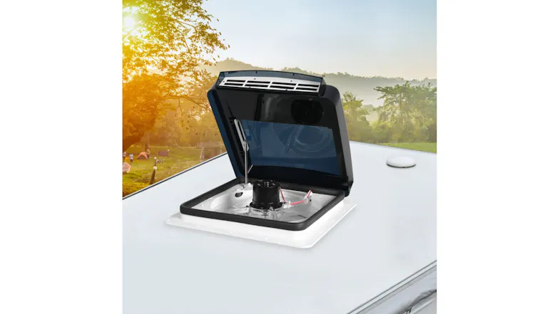 Trailer roof ventilation fan open, showing internal components on the RV rooftop with outdoor scenery Trailer roof ventilation fan open, showing internal components on the RV rooftop with outdoor scenery