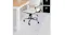 An office chair positioned on a clear Marlow square chair mat with pins, protecting the carpet flooring An office chair positioned on a clear Marlow square chair mat with pins, protecting the carpet flooring