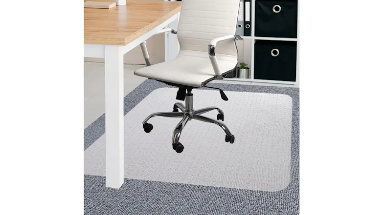 White office chair on a floor protection mat under the desk White office chair on a floor protection mat under the desk